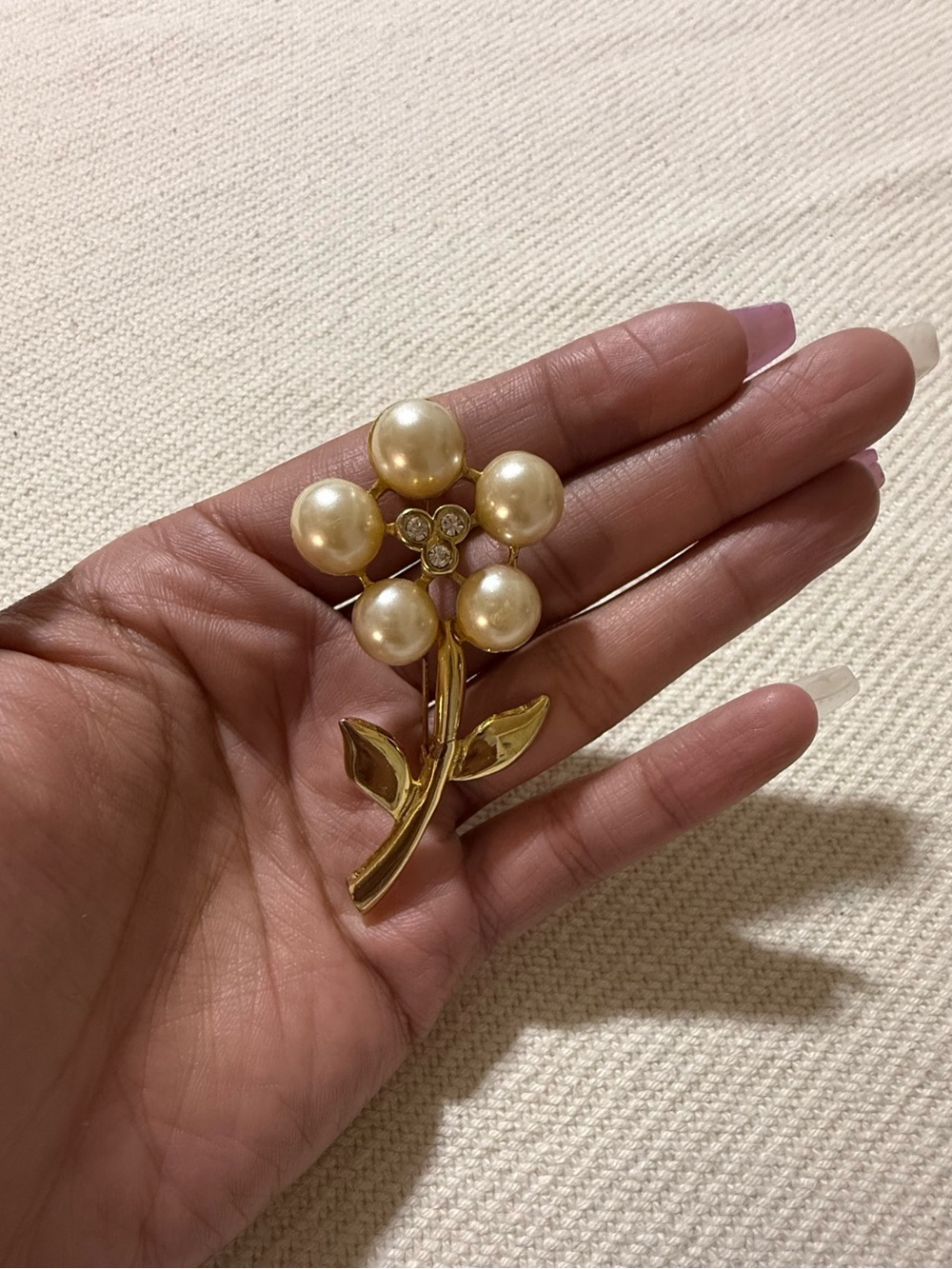 Vintage faux pearl flower stem brooch.